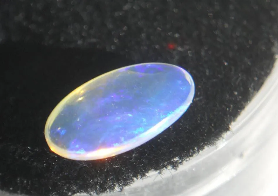 CRYSTAL OPAL FROM AUSTRALIA BLUE .PURPLE/GREEN,YELLOW