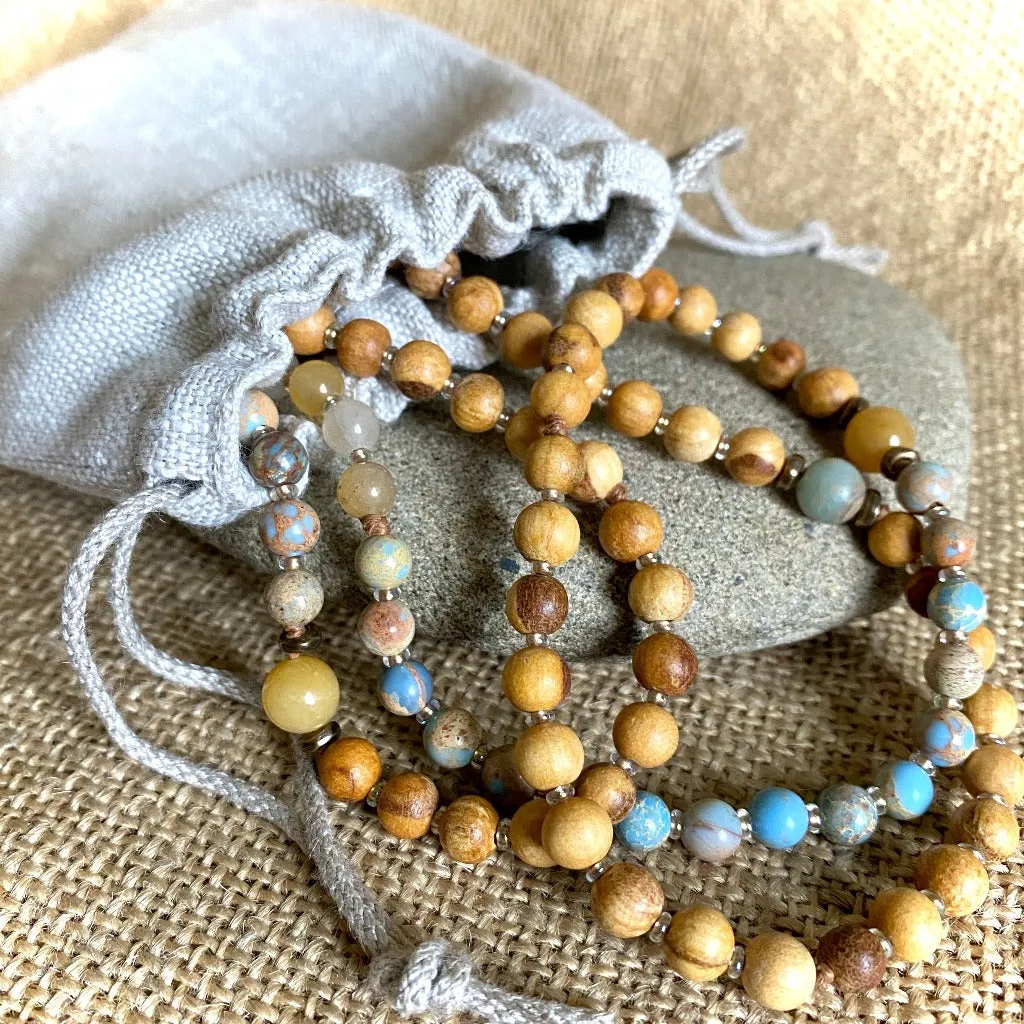 Mala with Kyanite, Labradorite, Palo Santo Beads, Sari Silk Tassel