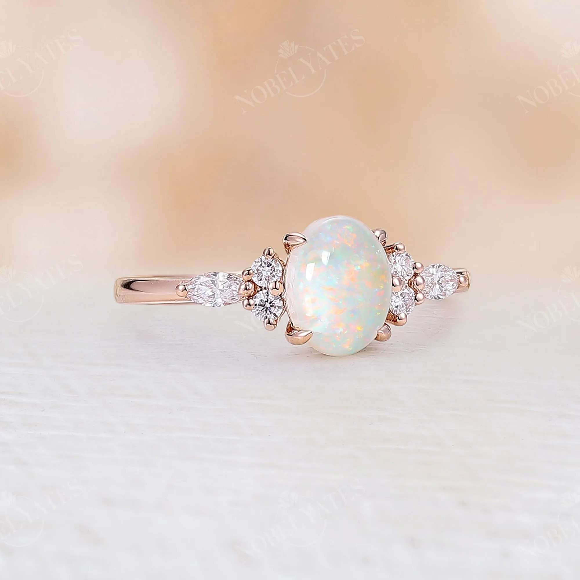 Oval White Opal Side Stone Engagement Ring Rose Gold